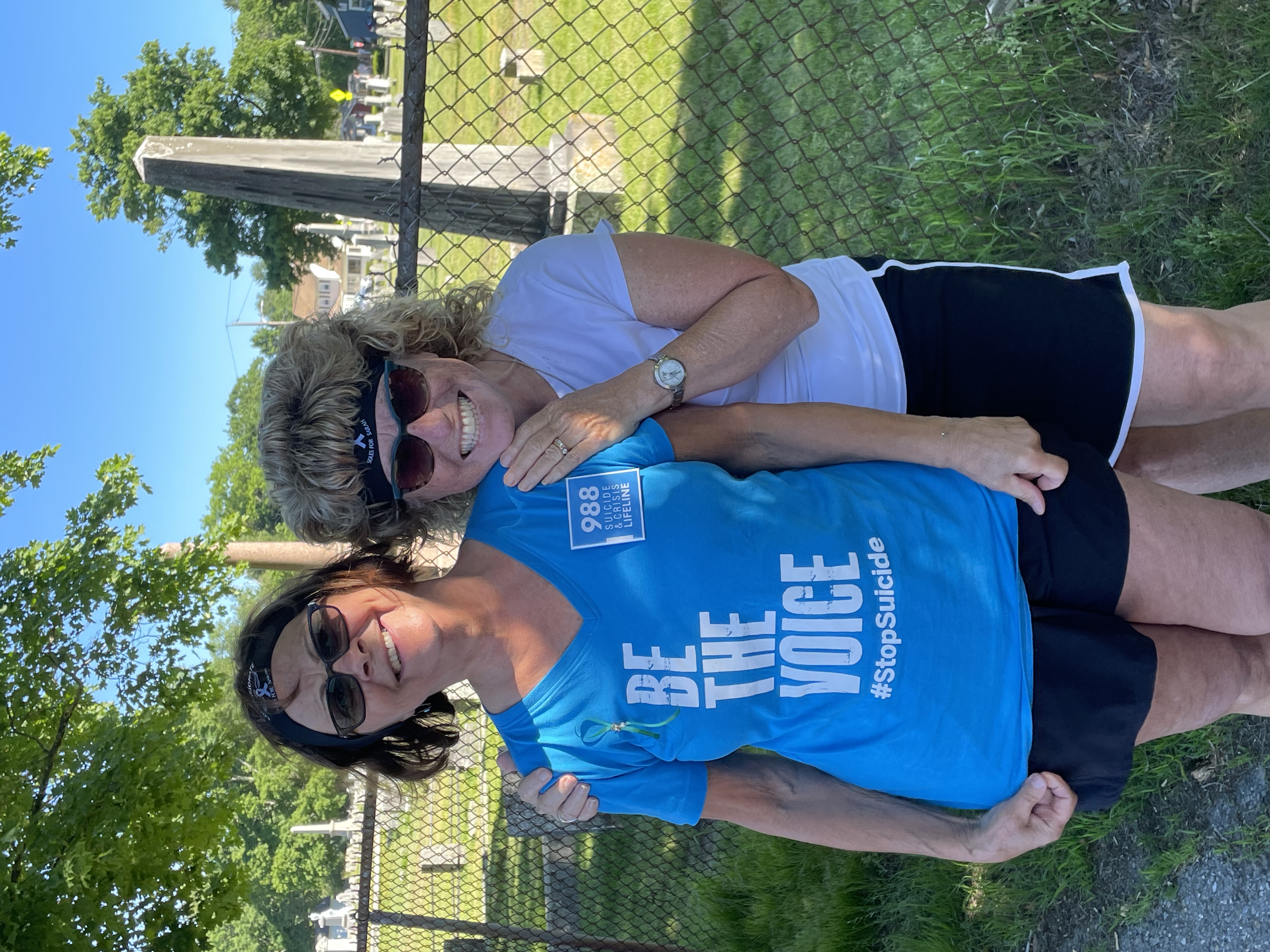 Two women wearing Be The Voice shirts at the 5K